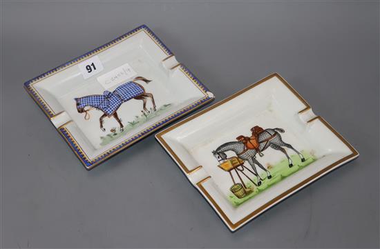 Hermes Paris. Two equestrian porcelain cigar ashtrays.